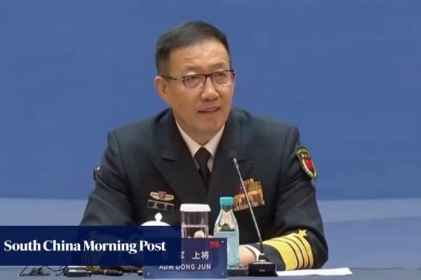 Chinese Defence Minister Dong Jun back in public as Xi calls for military stability