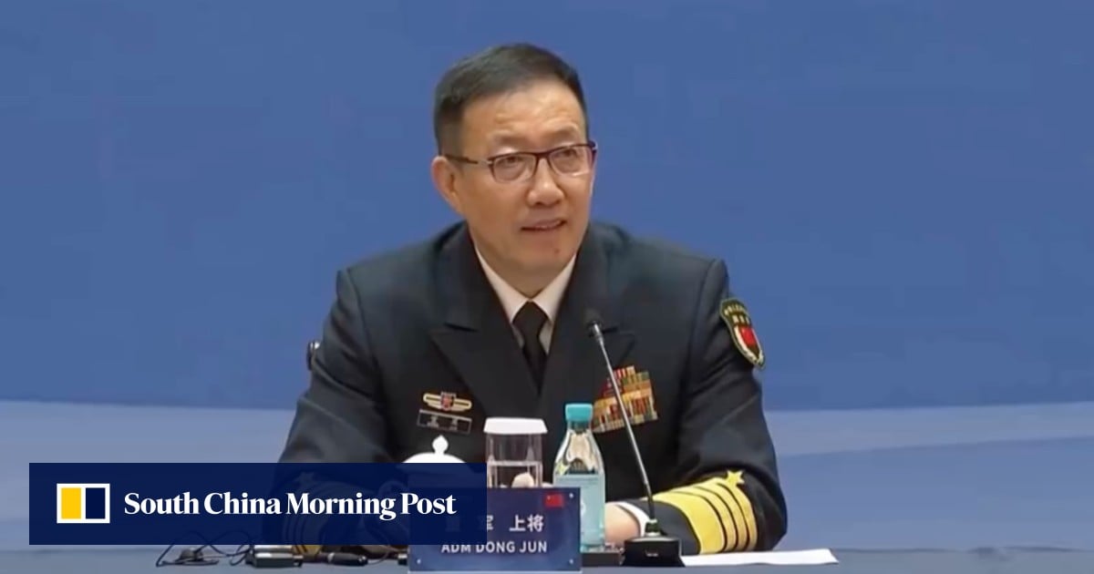 Chinese Defence Minister Dong Jun back in public as Xi calls for military stability