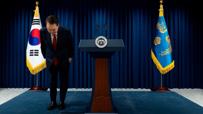 Yoon Suk Yeol bows after apologising on Saturday for his martial law declaration