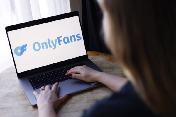 OnlyFans Logo Diplayed on Laptop