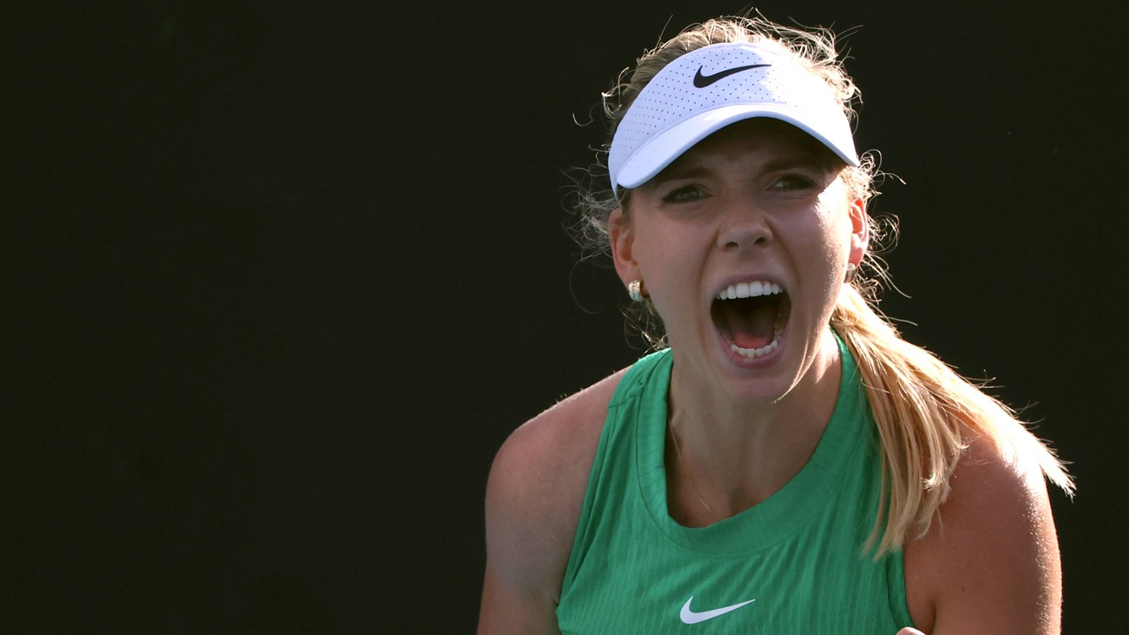 Katie Boulter of Britain reacts after winning a point against Yuan Yue of China during their first round match at the Australian Open tennis championships at Melbourne Park, Melbourne, Australia, Tuesday, Jan. 16, 2024. (AP Photo/Asanka Brendon Ratnayake)