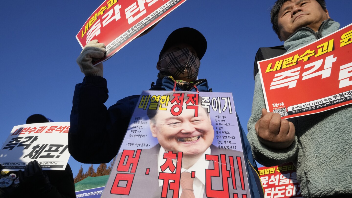 South Korea's opposition party urges president to resign or face impeachment