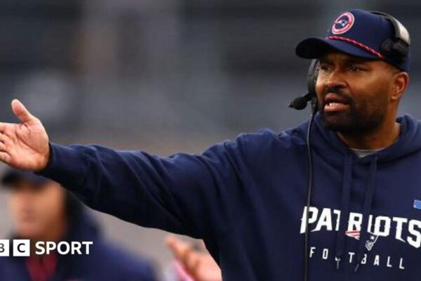 New England Patriots head coach Jerod Mayo points to the field during a game against the Los Angeles Chargers