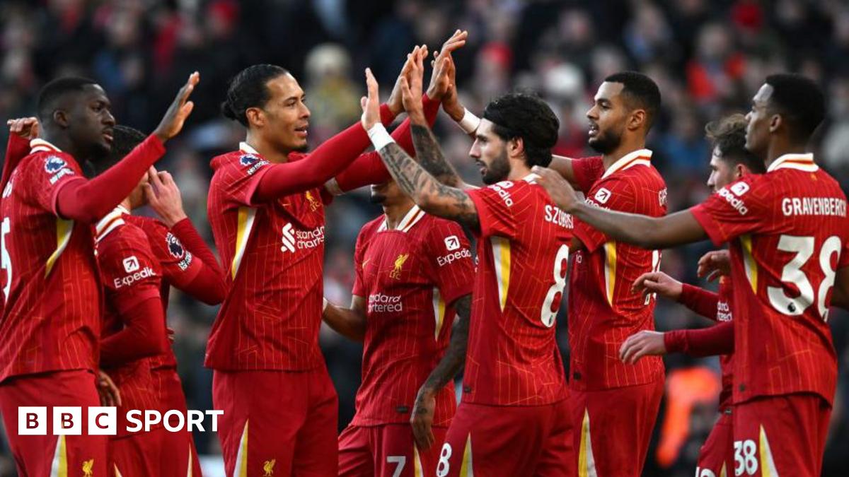 Liverpool players celebrate scoring against Ipswich