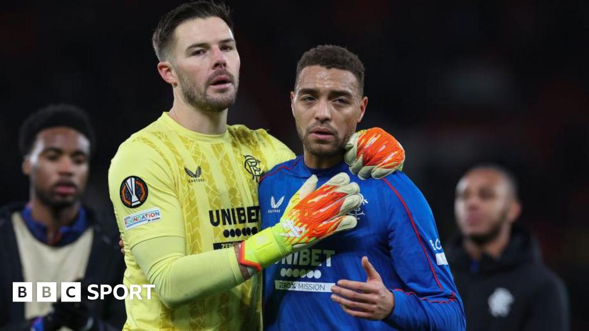 Jack Butland of Rangers and Cyriel Dessers of Rangers are seen at full time during the UEFA Europa League 2024/25 League Phase MD7 match between Manchester United and Rangers FC at Old Trafford on January 23, 2025 in Manchester, England.