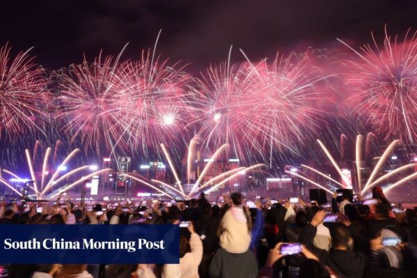 Lunar New Year fireworks light up Victoria Harbour in Hong Kong