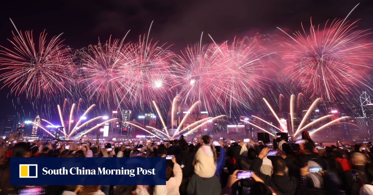 Lunar New Year fireworks light up Victoria Harbour in Hong Kong