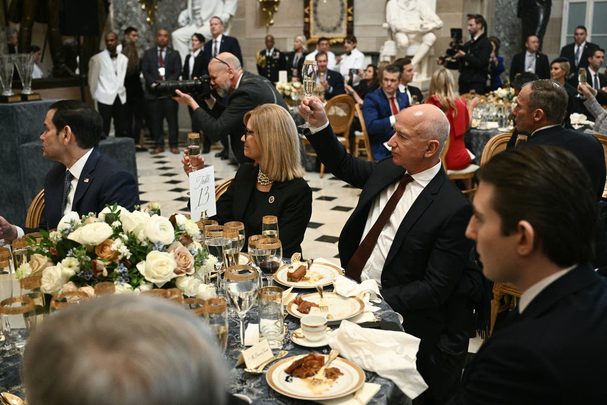 Jeff Bezos locked in conversation with Barron Trump at inauguration luncheon