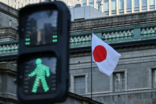 Asian markets build on Trump rally, yen climbs after BoJ cut