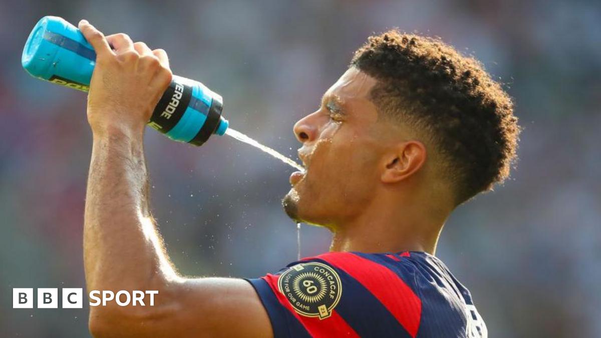 United States defender Miles Robinson takes a drink during a break on a hot day in the second half of a Concacaf Gold Cup match between Canada and the United States in July 2021