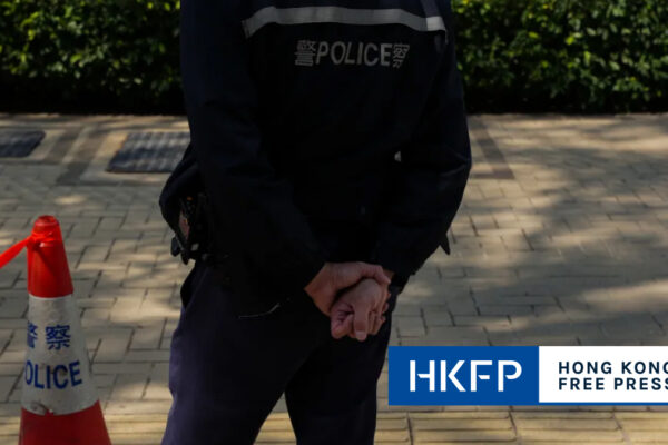 Hong Kong off-duty policeman tries to grab gun from colleague after arrest for alleged upskirting