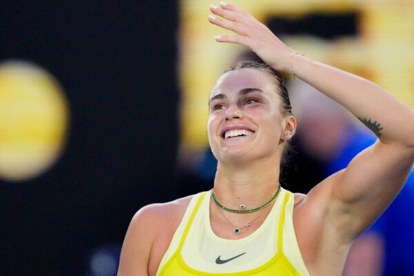 Aryna Sabalenka of Belarus reacts after defeating Sloane Stephens of the U.S. in their first round match at the Australian Open tennis championship in Melbourne, Australia, Sunday, Jan. 12, 2025. (AP Photo/Vincent Thian)