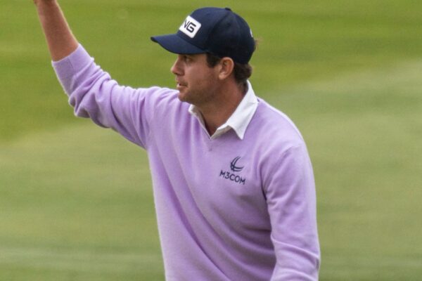 LA JOLLA, CA - JANUARY 25: Harris English holds up his ball after making his tournament winning putt on the 18th green during the final round of the Farmers Insurance Open tournament, Saturday, January 25, 2025, at Torrey Pines Golf Course in La Jolla, California. (Photo by Tony Ding/Icon Sportswire) (Icon Sportswire via AP Images)