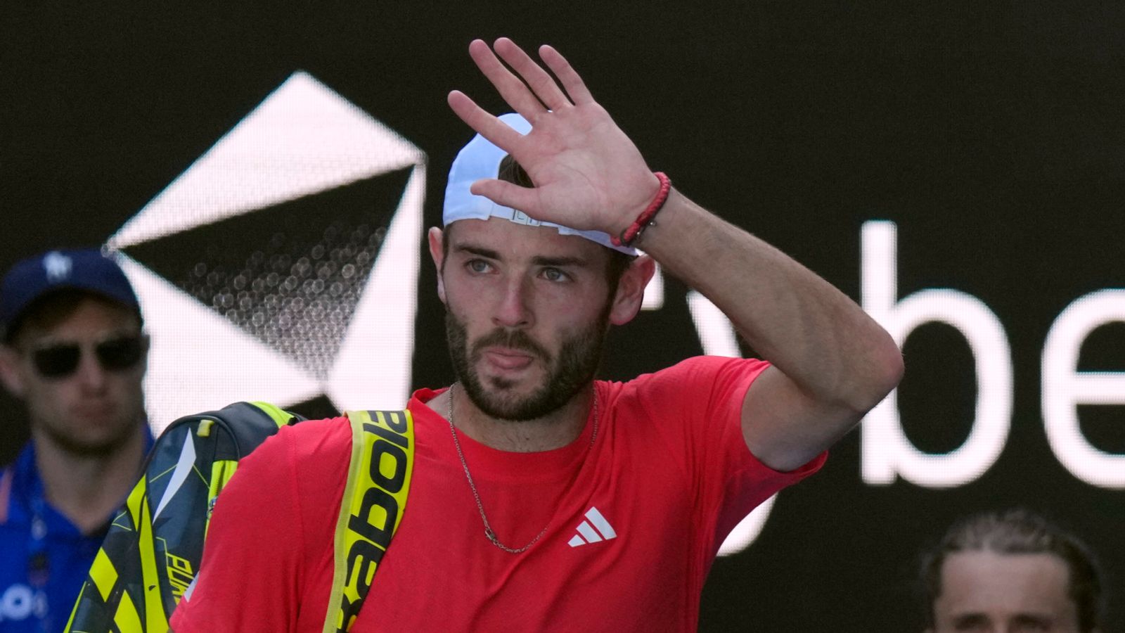 Jacob Fearnley waves as he leaves the court following his third-round loss to Alexander Zverev at the Australian Open