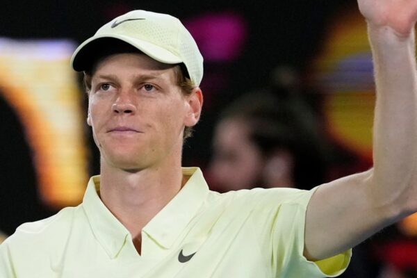 Jannik Sinner of Italy waves after defeating Tristan Schoolkate of Australia in their second round match at the Australian Open tennis championship in Melbourne, Australia, Thursday, Jan. 16, 2025. (AP Photo/Asanka Brendon Ratnayake)