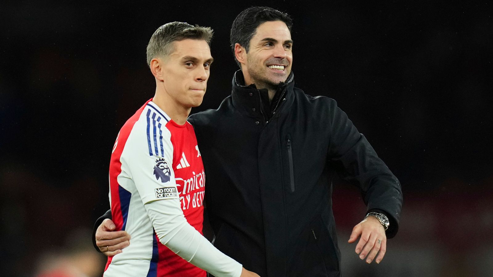 Arsenal boss Mikel Arteta pictured with Leandro Trossard