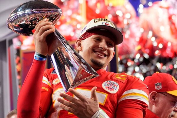 Patrick Mahomes celebrates with the Vince Lombardi trophy