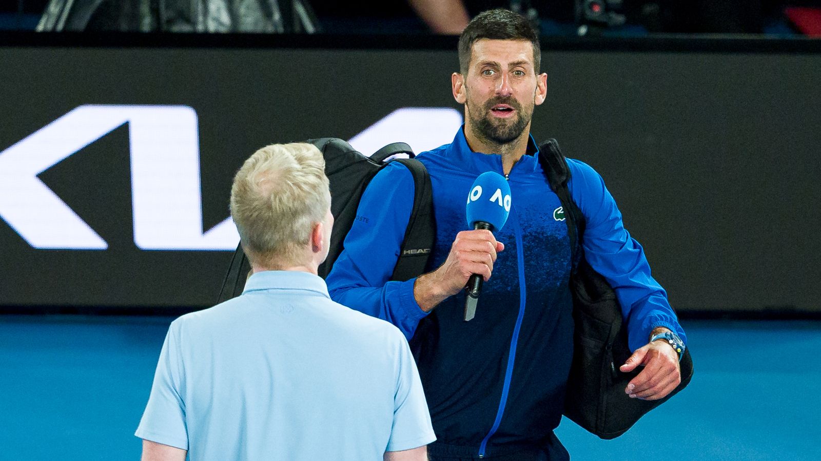 Novak Djokovic of Serbia speaks to the crowd following victory against Jiri Lehecka of the Czech Republic in the Men's Singles Fourth Round match during day eight of the 2025 Australian Open at Melbourne Park on January 19, 2025 in Melbourne, Australia. (Photo by Andy Cheung/Getty Images)