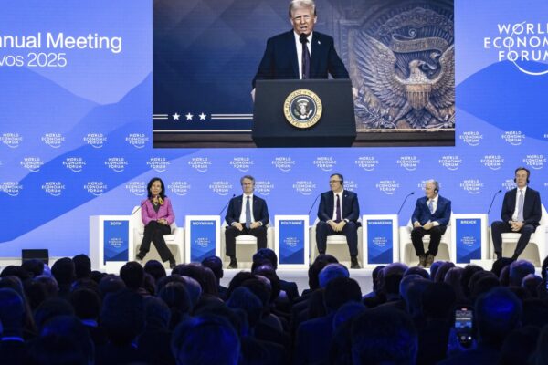 Trump tells Davos elite to invest in US or face tariffs