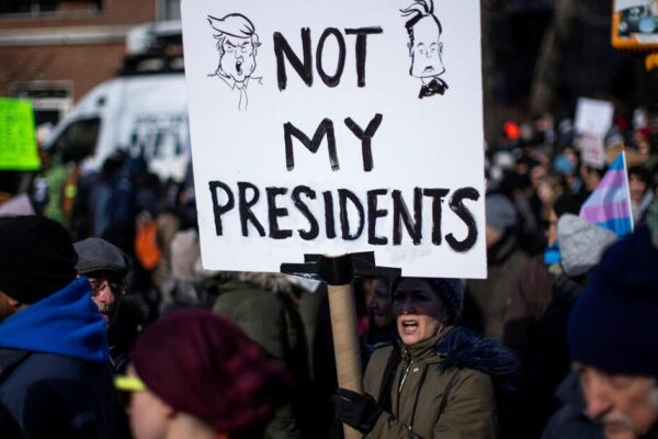 Protests target Trump, Musk and DOGE in "No Kings on Presidents Day" rallies in cities nationwide