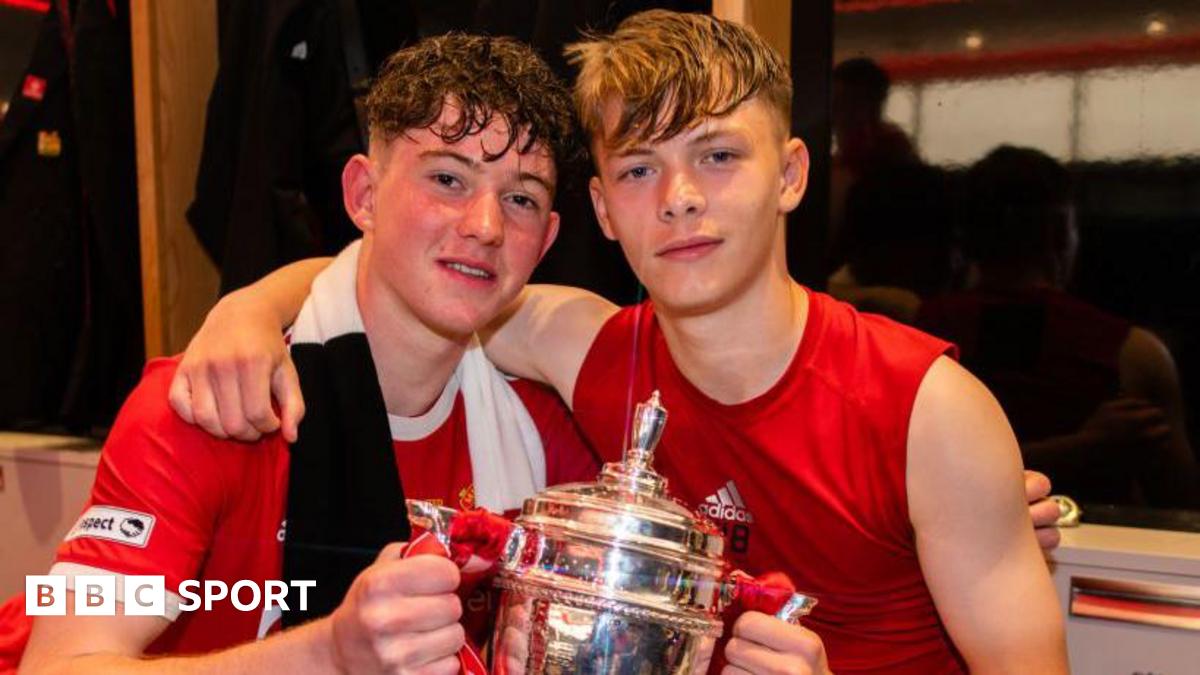 Louis Jackson [left] and Sam Mather [right] pose with the FA Youth Cup