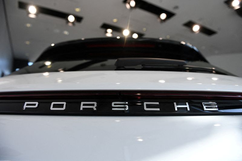 Porsche starts talks to end CFO, sales chief contracts