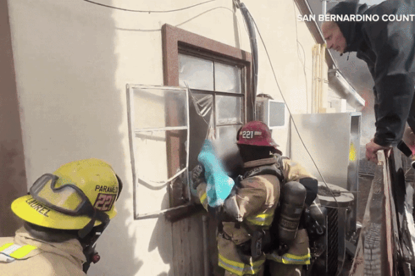 Firefighters Rescue Child From Burning Building in San Bernardino