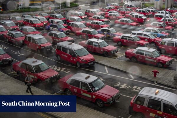 Hong Kong taxi union threatens 5-day strike if city fails to clamp down on Uber