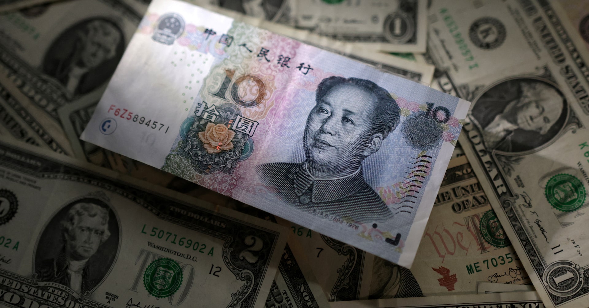 Yuan hits record low, Mexican peso, Canadian dollar tumble on Trump tariffs