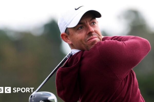 Rory McIlroy follows his tee shot on the third hole at Pebble Beach on Friday