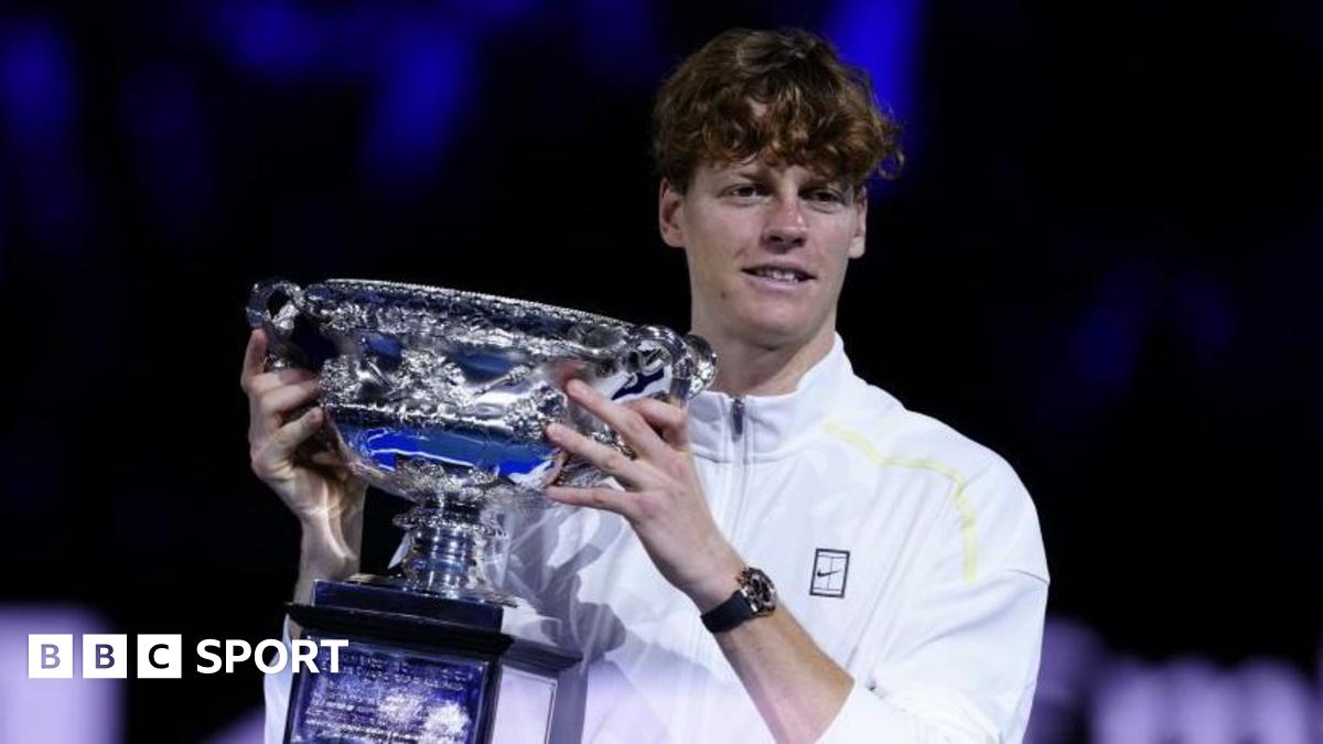 Jannik Sinner with the Australian Open men's singles trophy