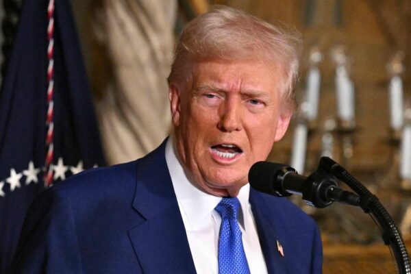 President Donald Trump speaks at Mar-a-Lago in Palm Beach, Fla., Tuesday, Feb. 18, 2025. (Pool via AP)