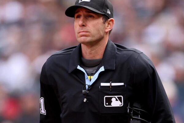 MLB fires umpire for sharing sports gambling account with poker player who bet on baseball