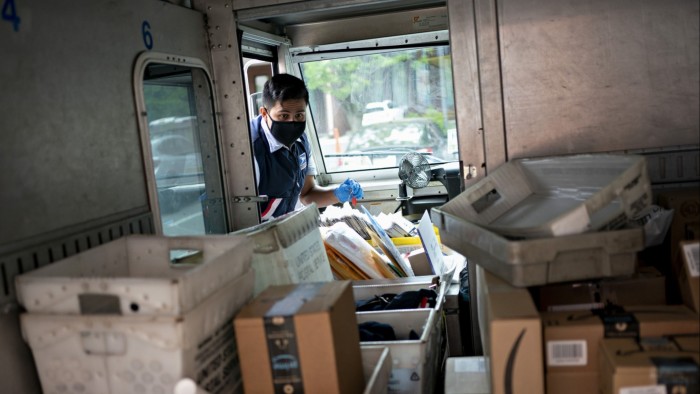 A US Postal Service letter examines a truck full of shipments in Virginia