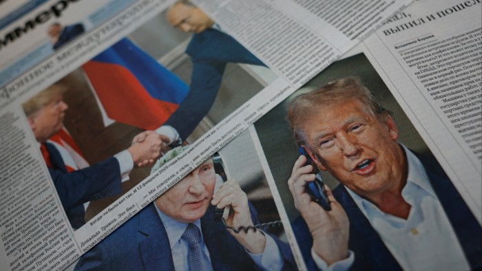 Daily newspapers with covers, dedicated to the recent phone call of Russian President Vladimir Putin and U.S. President Donald Trump, are laid out at a newsstand in a street in Moscow, Russia, February 13