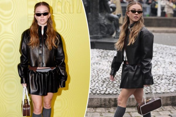 Sydney Sweeney pairs leather miniskirt look with leg warmers at Paris Fashion Week