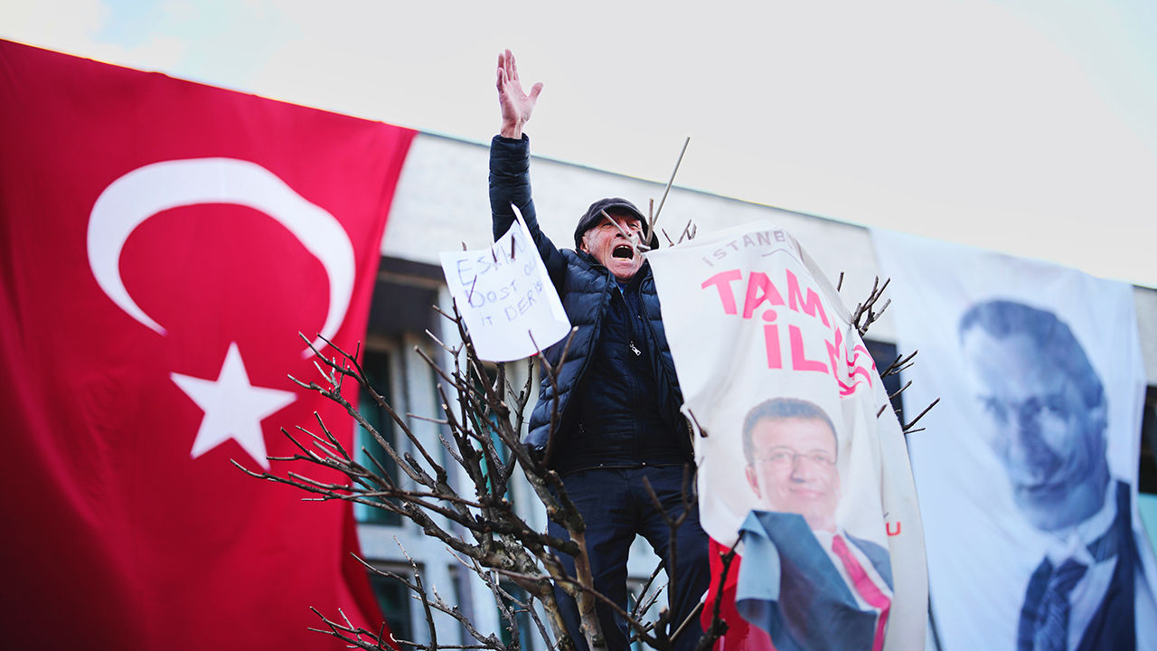 People gather outside the City Hall to protest the arrest of Istanbul Mayor Ekrem Imamoglu in Istanbul, Turkey