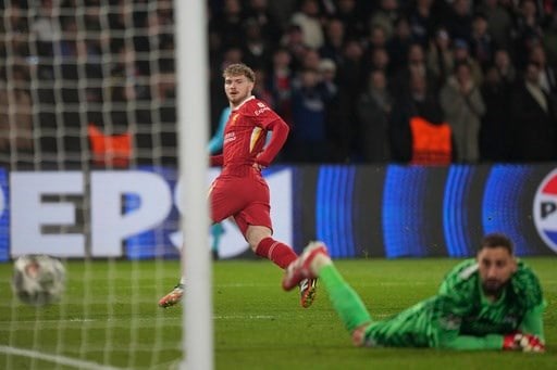 Liverpool stuns PSG with late winner in Champions League and 10-man Barcelona beats Benfica