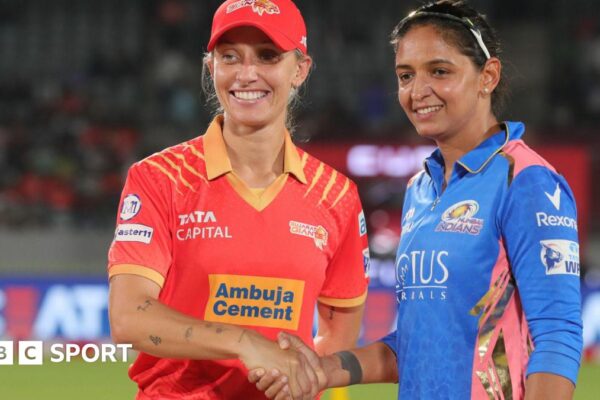 Ashleigh Gardner (c) of Gujarat Giants and Harmanpreet Kaur (c) of Mumbai Indians during match 5 of the Women's Premier League 2025 (WPL)