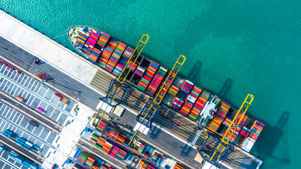 A cargo ship docked at the port.