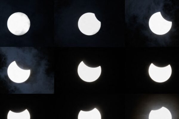In Pics: Skygazers across UK, US and Europe watch partial solar eclipse | World News In Pics: Skygazers across UK, US and Europe watch partial solar eclipse | World News
