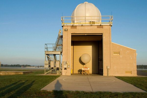 A National Weather Service weather balloon sits ready for launch in the Upper Air Inflation Building at the National Weather Service, April 27, 2006, in Sterling, Va. (AP Photo/Chris Greenberg, File)