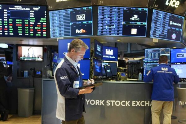 Dow drops nearly 650 points on worries that Trump's latest tariffs will slow the economy more