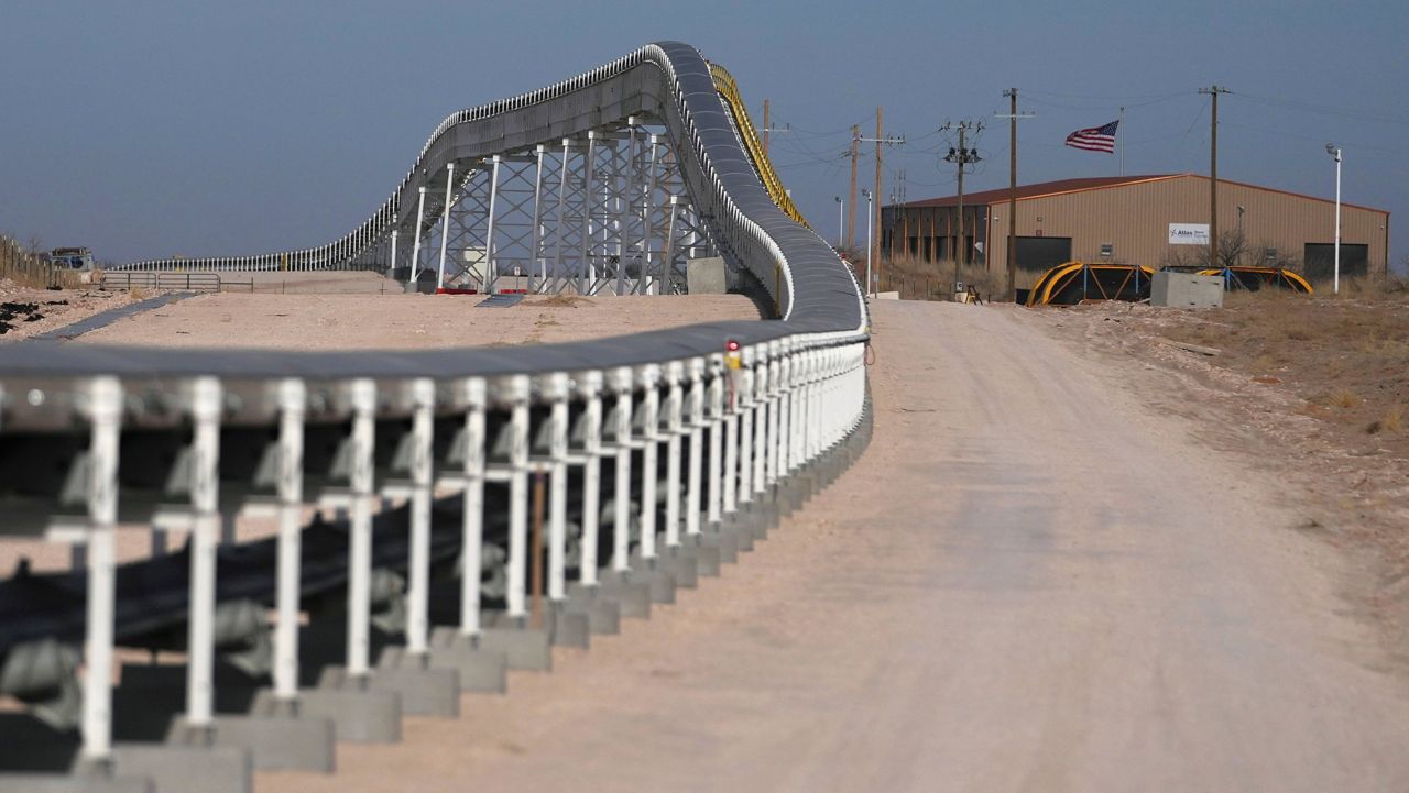 A 42-mile conveyor belt by Atlas Energy carries sand needed for hydraulic fracturing Wednesday, Feb. 26, 2025, in Kermit, Texas. (AP Photo/Julio Cortez)