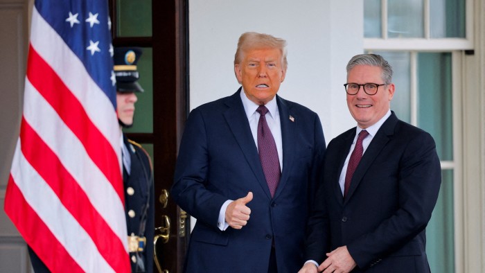 Donald Trump stands beside Keir Starmer at the White House.