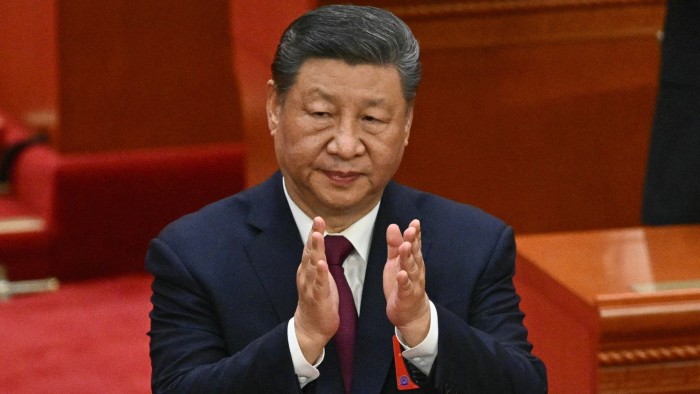 China’s President Xi Jinping applauds during the closing session of the National People’s Congress at the Great Hall of the People in Beijing this week