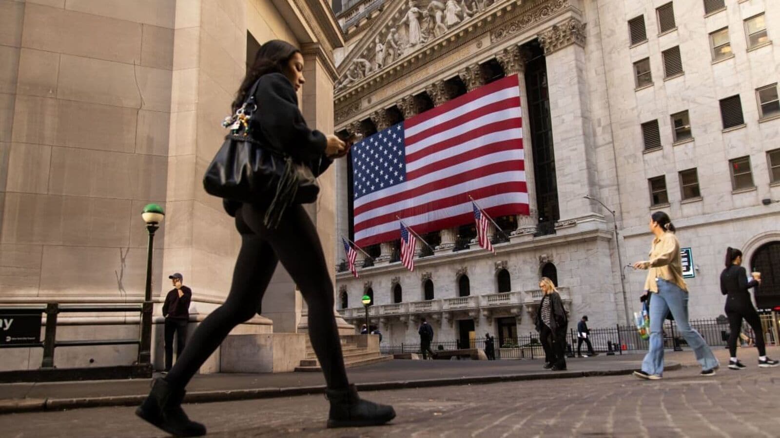 Wall Street Today: US stocks recoup early losses after US Fed’s dovish outlook, Dow up 40,000 points; Meta gains 4%