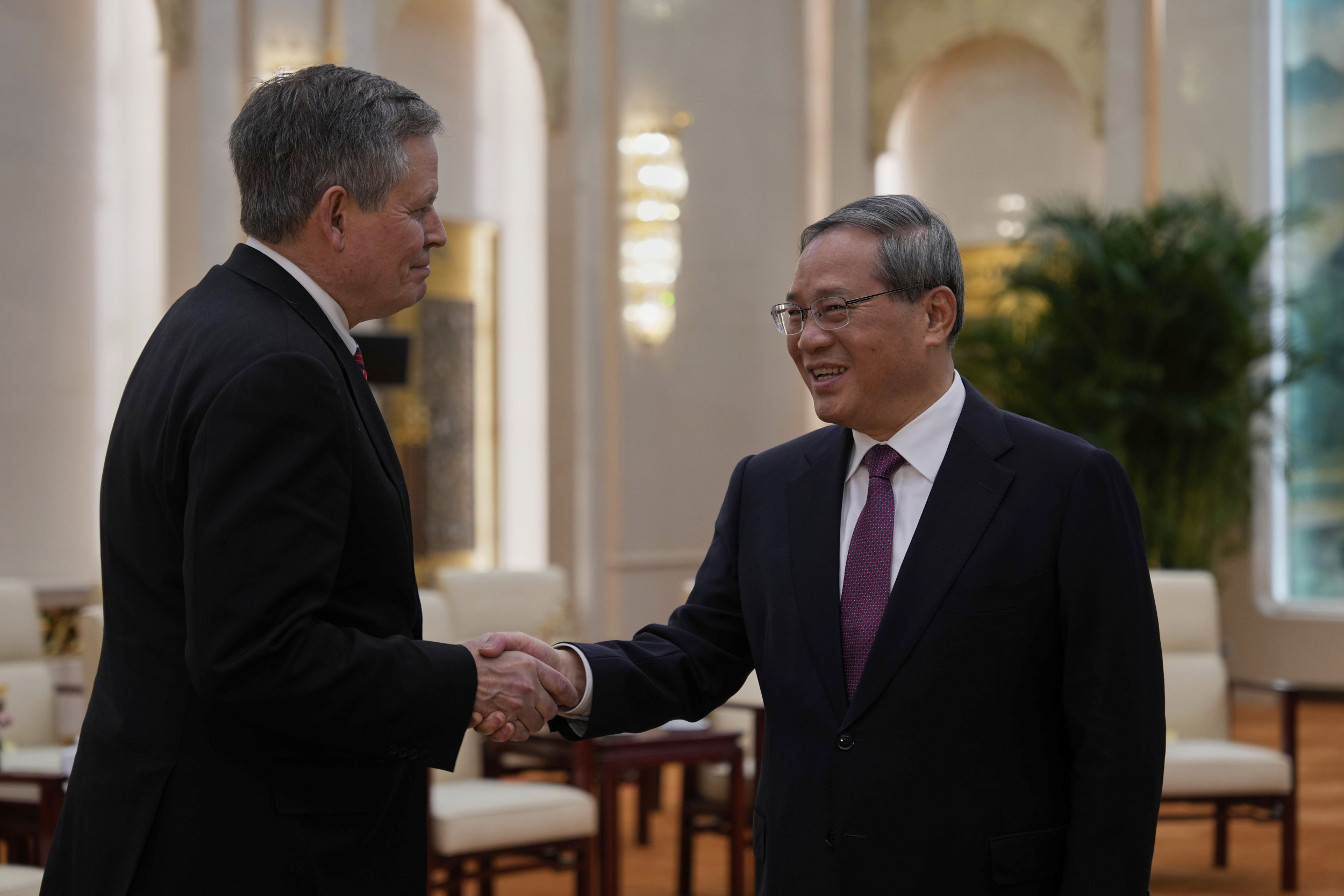 Qiang Greets Daines