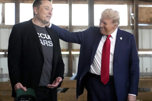 Trump says he'll buy a Tesla to show support for Musk as his company faces financial trouble