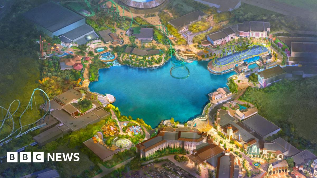 An artist impression of a map of what the Universal site could look like. A large body of water sits in the centre with various zones and rides around the edge. There is a logo in the bottom right-hand corner that reads: "Universal Destinations & Experiences".